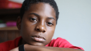 Johnny, 13, at the homeless shelter where his family lives.